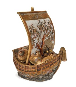 A rare and important SATSUMA koro and cover modelled as a Takarabune, finely painted with the Shichifujijin and Karako children, Meiji period, 19th century. Painted by SHOKADO. 22cm high, 21cm long