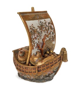 A rare and important SATSUMA koro and cover modelled as a Takarabune, finely painted with the Shichifujijin and Karako children, Meiji period, 19th century. Painted by SHOKADO. 22cm high, 21cm long