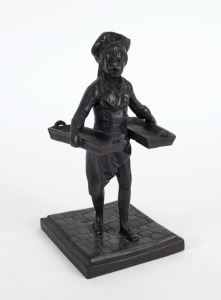 ARTIST UNKNOWN, cast bronze statue of a boy carrying two baskets, 20th century, ​​​​​​​22cm high