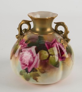 ROYAL WORCESTER English porcelain two handled vase with hand-painted rose decoration, signed J. FLAXMAN", early 20th century, green factory mark to base, 13.5cm high,
