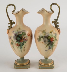 ROYAL WORCESTER pair of antique English porcelain ewers, with hand-painted floral decoration, 19th century, green factory marks to bases, 19cm high
