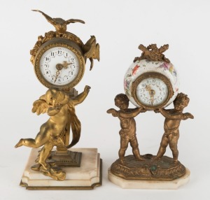 Two antique French table clocks with gilt metal cupid decorations, time pieces only, 19th century, the larger 24cm high