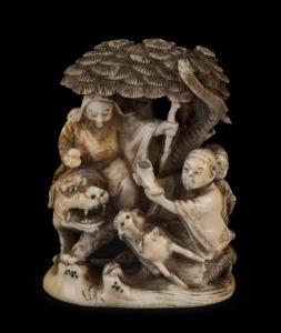A Japanese carved ivory netsuke figural group with tree, serpent, dragon, figures and lion, Meiji period, two character mark to base, 6.5cm high