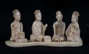 A Japanese carved ivory figural group of the Geisha musicians, Meiji period, red seal mark to base, 3cm high, 6.5cm wide