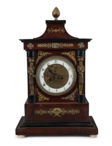 An antique Viennese mantle clock with 30 hour time and strike movement and automata dial of Putti working an anvil. Mahogany case with ebonized mouldings and ormolu mounts, early 19th century, 42cm high