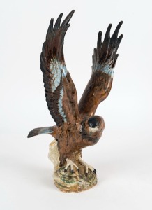 A Spanish porcelain eagle statue, late 20th century, 38cm high