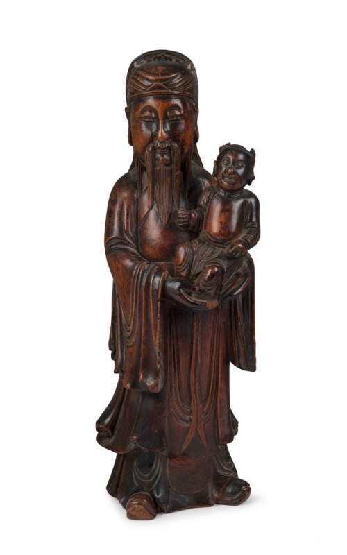 An antique Chinese carved wooden statue of a sage holding a child, Ming Dynasty, 17th century, ​​​​​​​35cm high