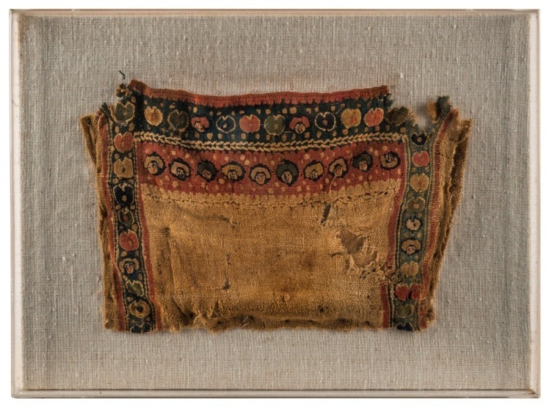 Ancient textile fragment, unknown origin and age, ​​​​​​​framed 29 x 39cm overall