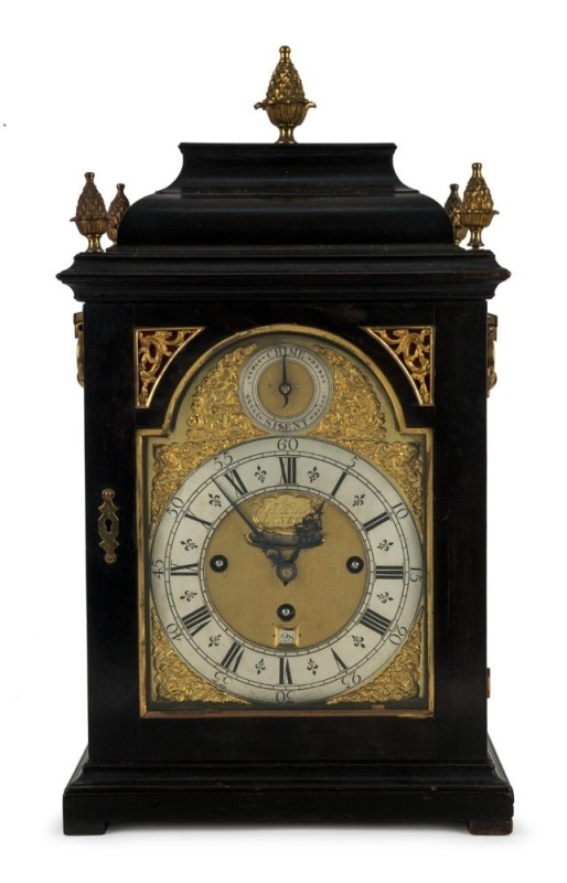 Georgian antique English spring table clock in ebonized bell top case with ormolu mounts, verge escapement three train fusee movement, striking the quarters on a nest of six bells, and the hour on a larger bell, dial marked "ANDREW DUNLOP, LONDON", circa