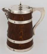 An antique English oak ale jug with silver plated mounts, 19th century, ​​​​​​​23cm high - 3