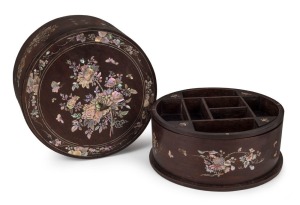 An antique Vietnamese circular wedding box, rosewood inlaid with mother of pearl, 19th century, interior fitted with inlaid lift-out tray, 11cm high, 23.5cm diameter