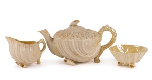 BELLEEK antique Irish porcelain teapot, milk jug and sugar bowl, 19th century, black stamp to the bases, the teapot 11cm high, 21cm wide