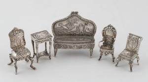 Five sterling silver and Continental silver miniature items of dolls house furniture, 19th and 20th century, the settee 7cm wide, 116 grams total