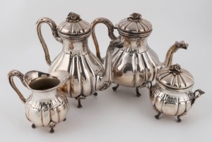 A silver plated four piece tea service with dragon spouts, the largest 23cm high