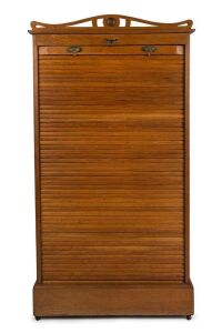 An antique American oak estate cabinet with tambour front, late 19th century, 171cm high, 88cm high, 50cm deep