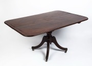 A Georgian mahogany tilt-top dining table with ebony string inlay, early 19th century, 74cm high, 148cm wide, 102cm deep