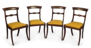 A fine set of four antique English mahogany spade back dining chairs with brass inlay, early 19th century,