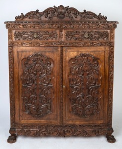 An Anglo-Indian carved cedar cabinet, 20th century, 158cm high, 120cm wide, 43cm deep