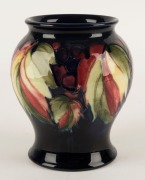 MOORCROFT "Berries" English pottery vase with blue ground,&nbsp; impressed signature and mark "W. Moorcroft&nbsp;Potter to H.M. The Queen, Made in England",&nbsp; 16cm high&nbsp; - 2