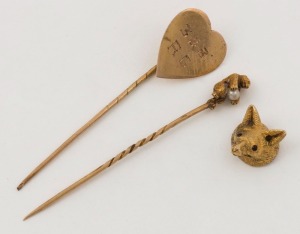 Two antique gold stickpins and a fox head stickpin top, 19th century, (3 items), the largest 5.5cm high, 6.1 grams total