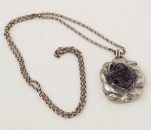 A vintage sterling silver and amethyst crystal specimen pendant on silver chain, circa 1970, ​​​​​​​the pendant 5cm high