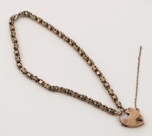 An antique 15ct rose gold heart lock on a silver gilt chain, 19th century,