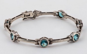 A vintage sterling silver bracelet, set with blue stones, circa 1970, stamped "925", ​​​​​​​20cm long