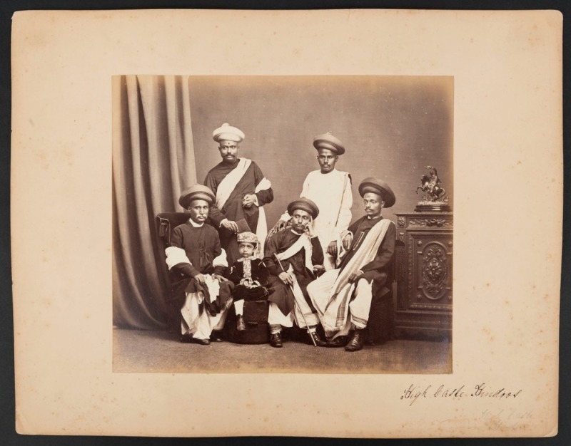 SAMUEL BOURNE (1834 - 1912), INDIA: "High Caste Hindoos" (also seen with title "Cashmere : A group of men", albumen print, circa 1865, laid down on album page and titled in manuscript, 25 x 28.5cm (image). Samuel Bourne was a British photographer known fo