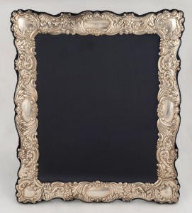 An English sterling silver picture frame with blue velvet and silk lining, 20th century, ​​​​​​​32 x 27cm
