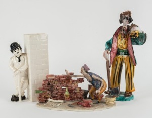 A vintage Italian pottery statue of a peasant woodcutter, Charlie Chaplin figural Japanese vase, and an Italian ceramic novelty statue, mid to late 20th century, (3 items), the largest 28cm high