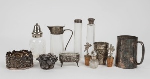 Silver topped vanity jars, silver plated pint mug, beaker, bottle coaster, cork stoppers, sugar castor, jug and a paperweight, 19th and 20th century, (12 items), the largest 18cm high