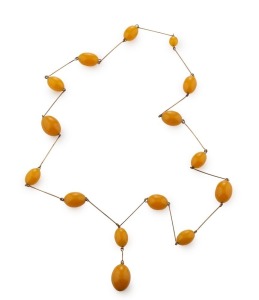 A vintage yellow amber bead necklace, early 20th century, ​​​​​​​80cm long