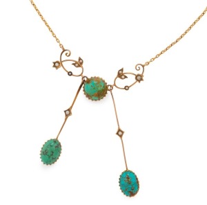 An antique yellow gold négligée necklace set with turquoise and seed pearls, circa 1910, pendant section 7.5cm high, necklace 40cm long