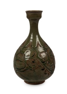 A Chinese celadon glazed gourd vase, Ming Dynasty, 16th/17th century, 24cm high 