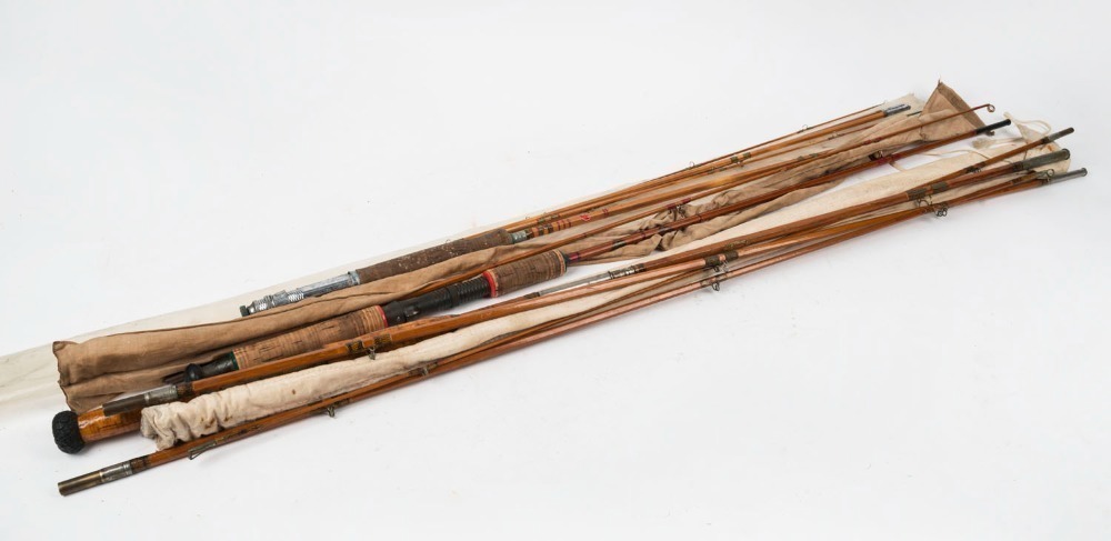 Three vintage split cane fishing rods including examples by E.J.