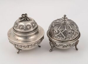 Two silver finished lidded bowls, Chinese and Indian, 20th century, the larger 9cm high