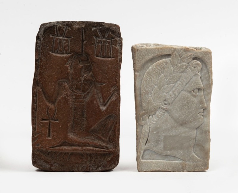 An Egyptian terracotta plaque; together with a carved marble profile portrait plaque, (2 items), unknown age and origin, ​​​​​​​12.5cm and 11cm high