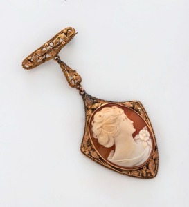 An Edwardian cameo brooch in rose gold mount, circa 1905, housed in a Dunklings box, ​​​​​​​7cm high overall