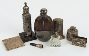 Assorted silver and silver plated items including powder compact, table cigar lighter, cigar holder, hip flask, match holder, condiment, lidded ink pot and tower ornament, 19th and 20th century, (8 items), the largest 17cm high