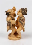 A Japanese carved ivory erotic okimono, 20th century,  4.5cm high 