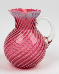 An American ruby and white opaline glass jug, 19th century, 23cm high