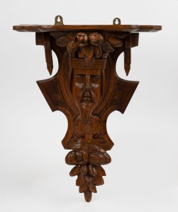 An antique English carved oak wall bracket with royal bust and floral decoration, late 19th century, ​​​​​​​45cm high