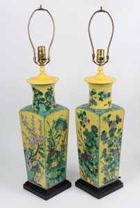 A pair of antique Chinese famille vert and yellow porcelain vases (converted to lamps), Qing Dynasty, underglaze blue Kangxi marks to bases, vases 48cm