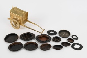 A Japanese gilt metal cart ornament, and a collection of sliding door handle inserts, 19th and 20th century, ​​​​​​​the cart 20cm long