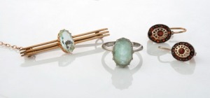 An antique gold bar brooch, pair of gold plate and garnet earrings, and a 9ct white gold ring with pale blue stone,