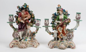 A pair of antique figural porcelain candelabra in the Chelsea style, possibly German, 18th/19th century, 27cm high