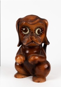 A German novelty dog clock with painted chalk ware case, 20th century, ​​​​​​​17cm high