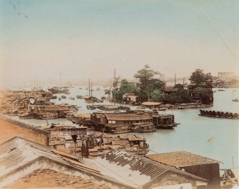 CHINA: River View, Canton, coloured albumen paper print, circa 1890, 21.5 x 27cm.