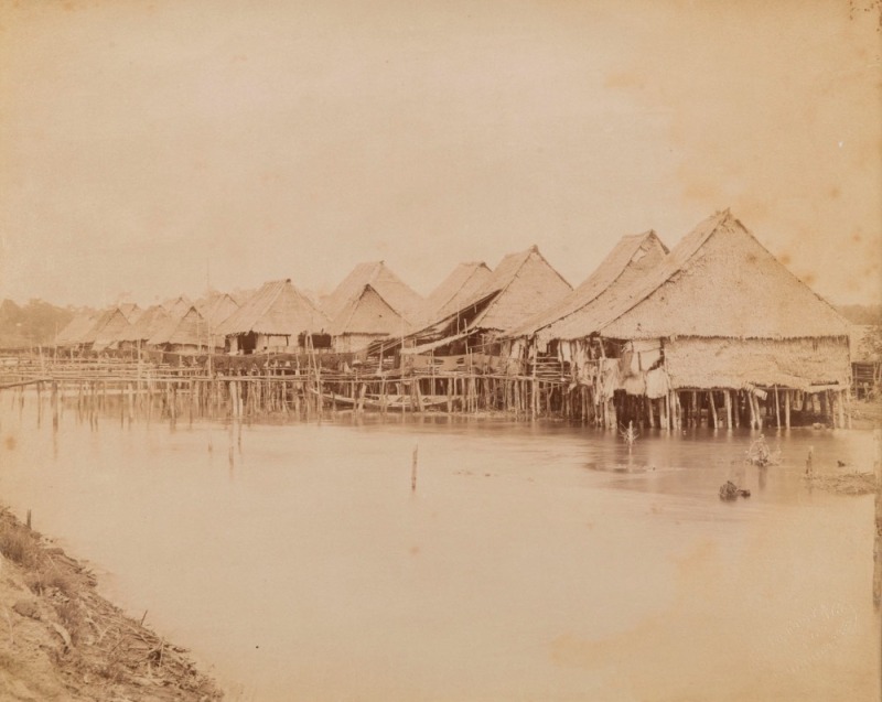 GUSTAVE RICHARD LAMBERT (Singapore River hut dwellings), albumen paper print, circa 1880s, photographer’s blind stamp on image lower right, 21.5 x 27.5cm, laid down on card.