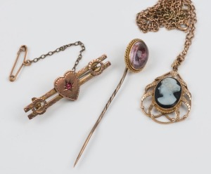 Antique 9ct gold bar brooch with red stone, gold and purple stone stickpin, and a gold mounted cameo pendant on chain, 19th and early 20th century, (3 items), the brooch 4.5cm wide, 12.5 grams total